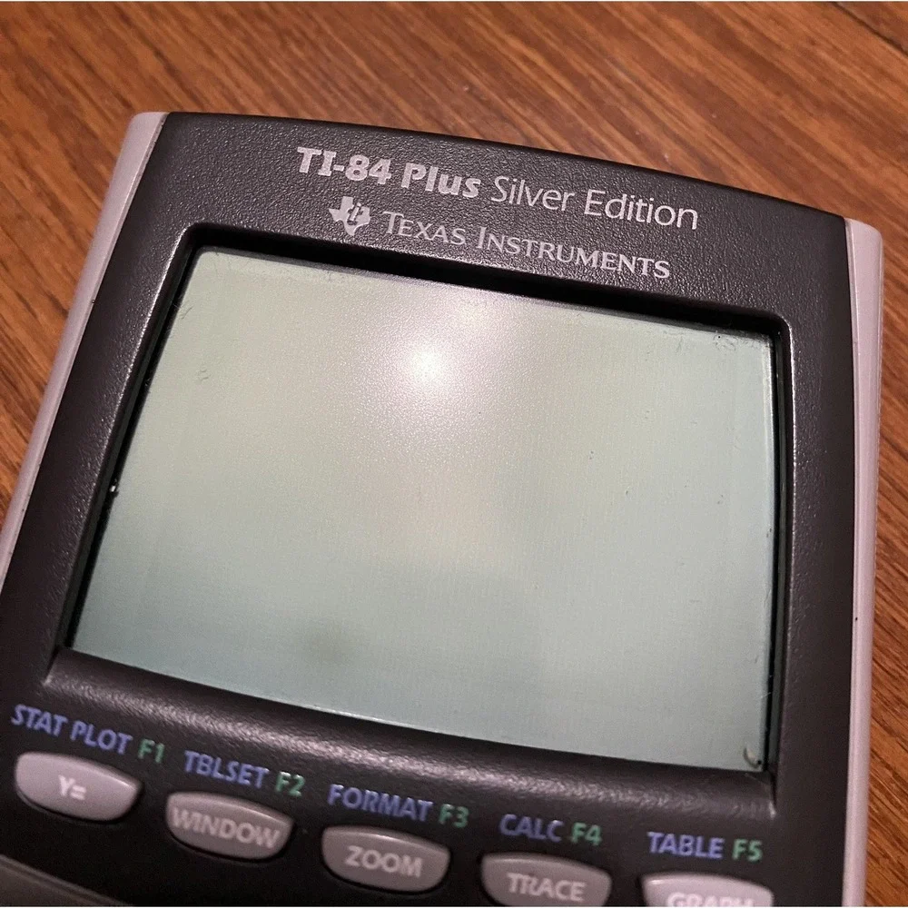 Texas Instruments TI-84 Plus Silver Edition Graphing Calculator TESTED‎